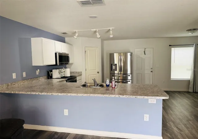 Photo 3 of Single family home for sale at 12020 Pine Warbler Ave, Brooksville, FL 34614 | MLS# W7889927 | Listing updated on 2026-09-30
