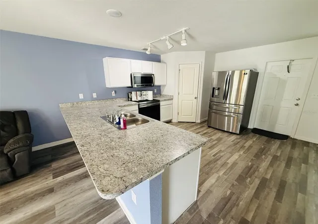 Photo 3 of Single family home for sale at 12020 Pine Warbler Ave, Brooksville, FL 34614 | MLS# W7889927 | Listing updated on 2026-09-30