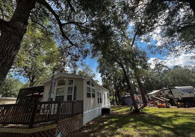 Photo 2 of Manufactured home for sale at 14195 Ne 252nd Court Rd #109, Fort Mc Coy, FL 32134 | MLS# OM733114 | Listing updated on 2026-10-01