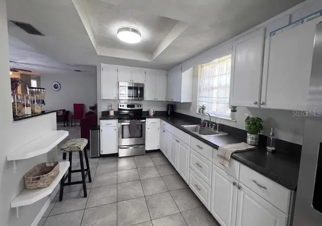 Photo 3 of Single family home for sale at 7815 Greybirch Ter, Port Richey, FL 34668 | MLS# TB8553381 | Listing updated on 2026-10-06