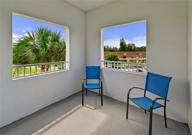 Listing Photo 2 - Condo for sale in building located at 2001 World Pkwy Blvd, CLEARWATER, FL 33763 - Unit #59