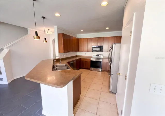 Photo 2 of Townhouse for sale at 348 Golden Dewdrop Way, Oviedo, FL 32765 | MLS# O6446031 | Listing updated on 2026-10-08