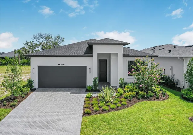 Photo 1 of Single family home for sale at 14375 Hammock Oak St, Parrish, FL 34219 | MLS# W7889938 | Listing updated on 2026-10-25
