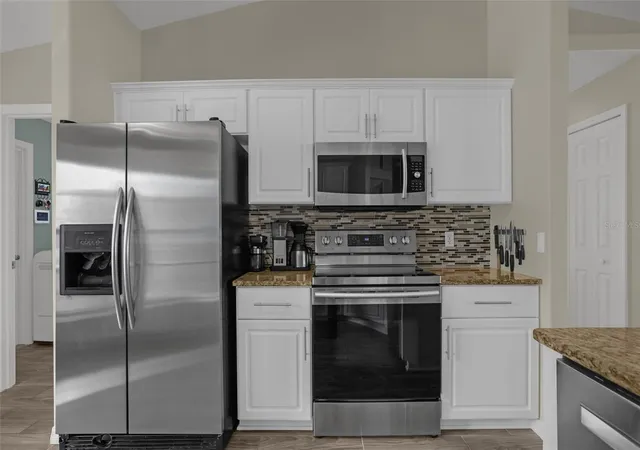 Photo 3 of Single family home for sale at 1601 Ross Dr, Deltona, FL 32738 | MLS# O6446040 | Listing updated on 2026-10-02