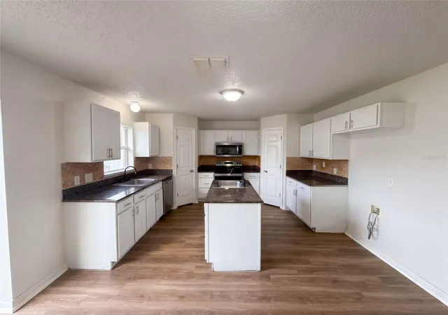 Photo 3 of Single family home for sale at 1818 Superior Ct, Kissimmee, FL 34759 | MLS# O6446045 | Listing updated on 2026-10-09