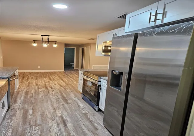 Photo 4 of Single family home for sale at 5008 Cynthia Ln, Spring Hill, FL 34606 | MLS# W7889944 | Listing updated on 2026-09-30