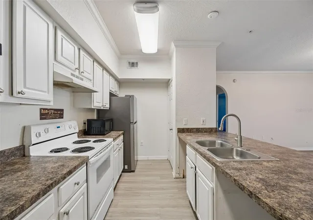 Photo 4 of Condo for sale at 911 N Orange Ave #411, Orlando, FL 32801 | MLS# O6446054 | Listing updated on 2026-10-07