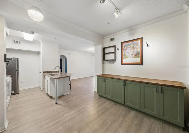 Photo 2 of Condo for sale at 911 N Orange Ave #411, Orlando, FL 32801 | MLS# O6446054 | Listing updated on 2026-10-07