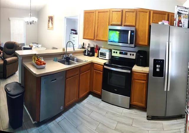 Photo 3 of Single family home for sale at 14938 Windy Mount Cir, Clermont, FL 34711 | MLS# O6446066 | Listing updated on 2026-10-23