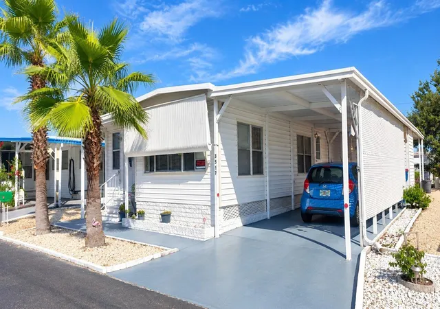Photo 1 of Manufactured home for sale at 3517 Tiki Dr W, Holiday, FL 34691 | MLS# TB8553459 | Listing updated on 2026-10-05