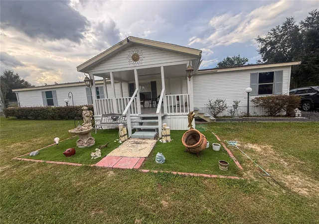 Photo 2 of Manufactured home for sale at 7485 Sw 19th Place, Ocala, FL 34474 | MLS# OM733137 | Listing updated on 2026-10-02