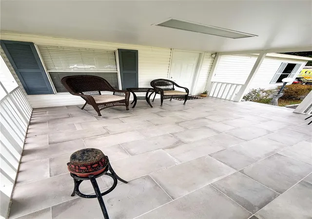 Photo 4 of Manufactured home for sale at 7485 SW 19th Place, Ocala, FL 34474 | MLS# OM733137 | Listing updated on 2026-10-02