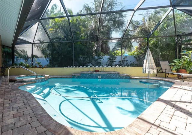 Photo 2 of Single family home for sale at 7106 Palm Dr, Holmes Beach, FL 34217 | MLS# A4707925 | Listing updated on 2026-10-21