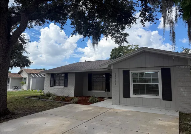 Photo 1 of Single family home for sale at 12418 Queensland Ln, Tampa, FL 33625 | MLS# TB8553480 | Listing updated on 2026-10-04