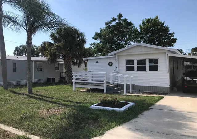 Photo 5 of Single family home for sale at 7037 Lofty Dr, PORT RICHEY, FL 34668 | MLS# TB8553482 | Listing updated on 2026-10-07