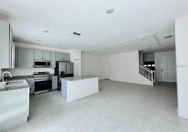 Photo 3 of Townhouse for sale at 34162 Cinder Way, Wesley Chapel, FL 33545 | MLS# TB8553496 | Listing updated on 2026-10-01