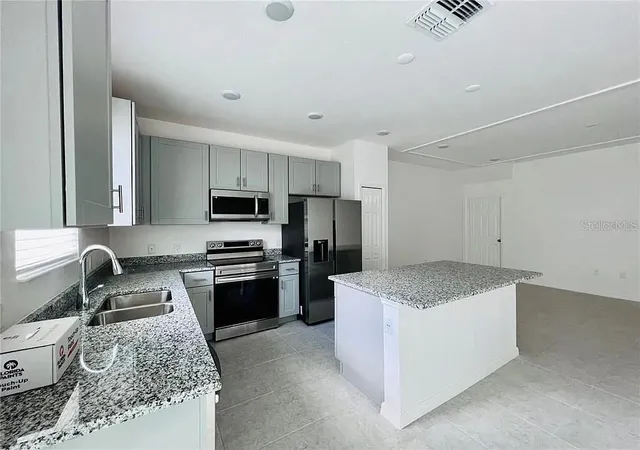 Photo 4 of Townhouse for sale at 34162 Cinder Way, Wesley Chapel, FL 33545 | MLS# TB8553496 | Listing updated on 2026-10-01