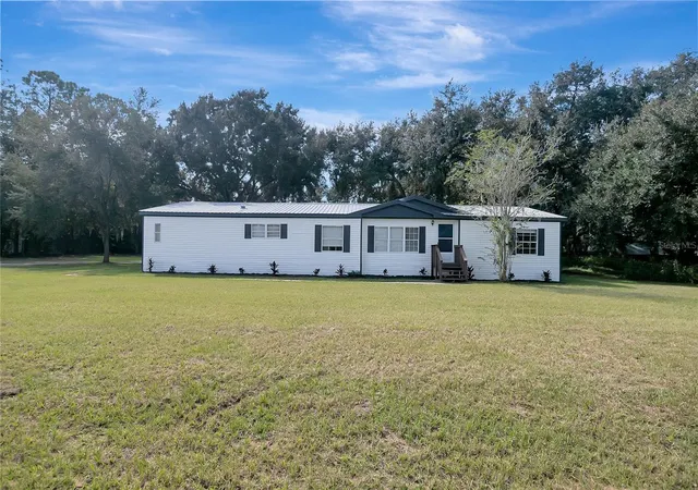 Photo 1 of Manufactured home for sale at 30148 Clearview Dr, Wesley Chapel, FL 33545 | MLS# TB8553518 | Listing updated on 2026-10-03