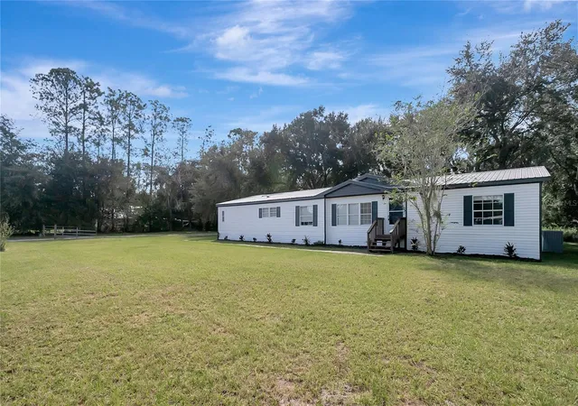 Photo 2 of Manufactured home for sale at 30148 Clearview Dr, Wesley Chapel, FL 33545 | MLS# TB8553518 | Listing updated on 2026-10-03