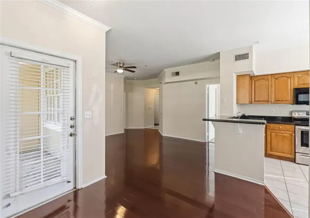 Photo 4 of Condo for sale at 2558 Robert Trent Jones Dr #1410, Orlando, FL 32835 | MLS# O6446123 | Listing updated on 2026-10-02