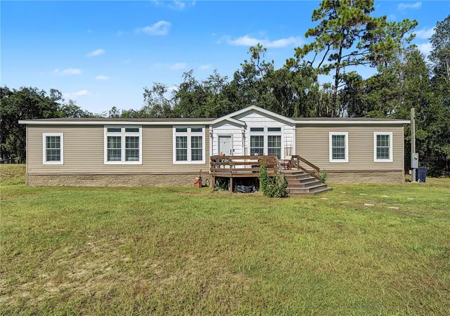 Photo 1 of Manufactured home for sale at 30436 Calle Ln, Wesley Chapel, FL 33543 | MLS# TB8553543 | Listing updated on 2026-10-03