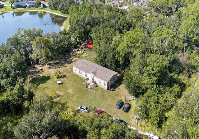 Photo 2 of Manufactured home for sale at 30436 Calle Ln, Wesley Chapel, FL 33543 | MLS# TB8553543 | Listing updated on 2026-10-03