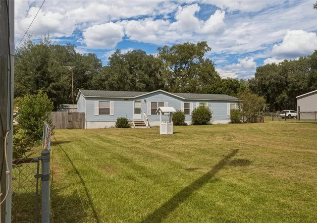 Photo 2 of Manufactured home for sale at 17198 SE 99th Avenue, Summerfield, FL 34491 | MLS# OM733156 | Listing updated on 2026-10-09