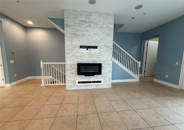 Photo 2 of Townhouse for sale at 12952 Brandon Coates Dr, Orlando, FL 32828 | MLS# O6446153 | Listing updated on 2026-10-01