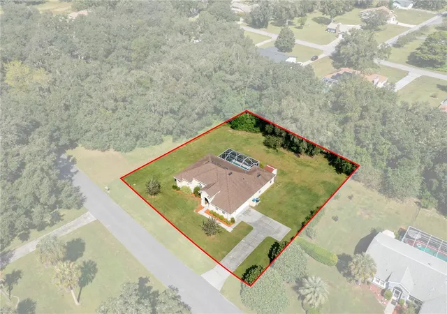 Photo 3 of Single family home for sale at 24051 Martin Dr, Brooksville, FL 34601 | MLS# W7889957 | Listing updated on 2026-10-04