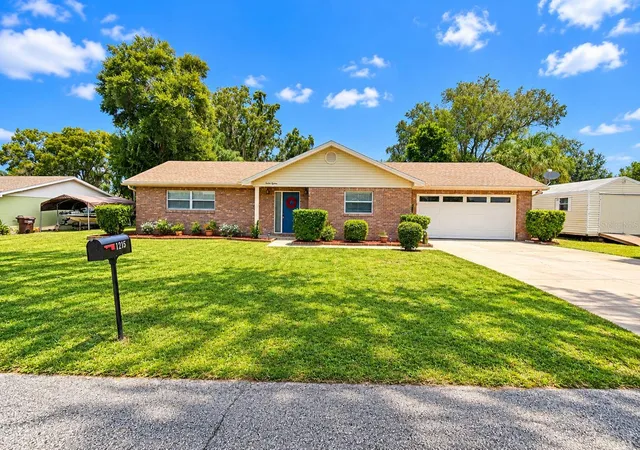Photo 1 of Single family home for sale at 1215 Fairlane Ct Nw, Winter Haven, FL 33881 | MLS# TB8553587 | Listing updated on 2026-10-01