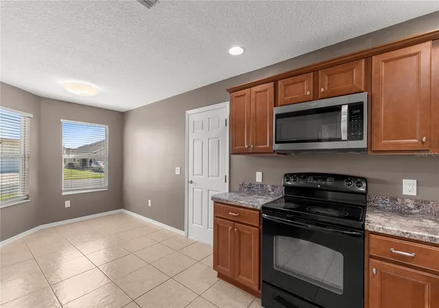 Photo 3 of Single family home for sale at 12166 NE 51st Circle, Oxford, FL 34484 | MLS# OM733171 | Listing updated on 2026-10-03