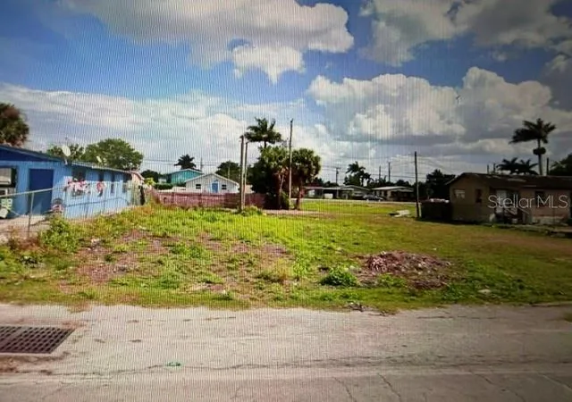 Photo 1 of Land for sale at 521 Sw 5th Street, Belle Glade, FL 33430 | MLS# TB8553630 | Listing updated on 2026-10-01
