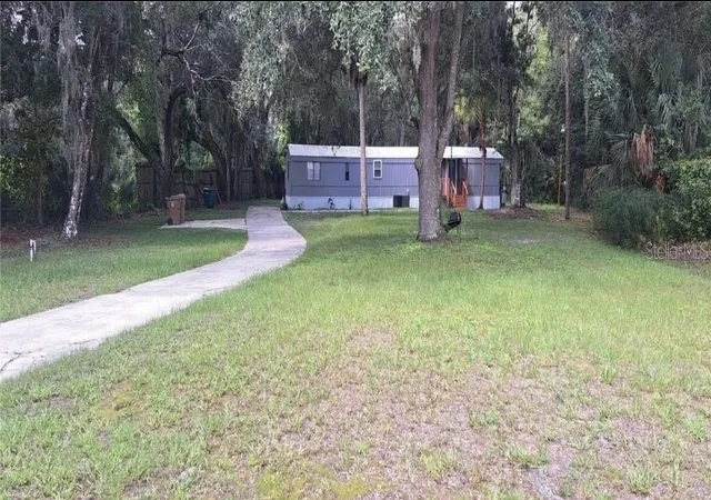 Photo 3 of Manufactured home for sale at 1650 Sandy Oak Dr, Davenport, FL 33896 | MLS# TB8553641 | Listing updated on 2026-10-03