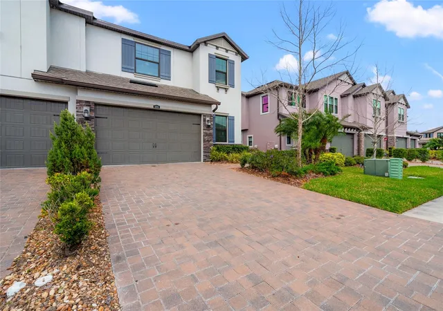 Photo 2 of Townhouse for sale at 4896 San Martino Dr, Wesley Chapel, FL 33543 | MLS# TB8553654 | Listing updated on 2026-10-06