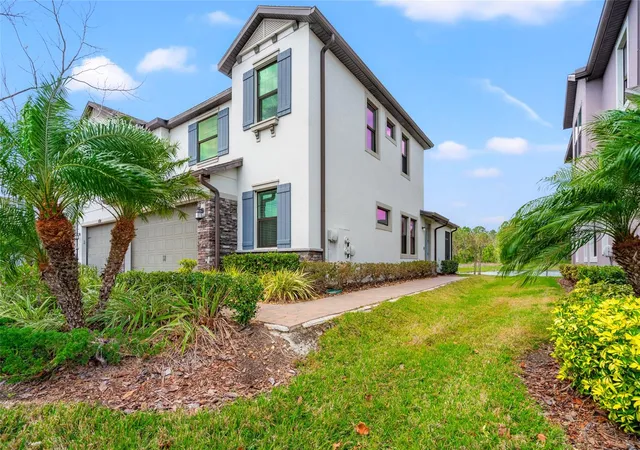 Photo 3 of Townhouse for sale at 4896 San Martino Dr, Wesley Chapel, FL 33543 | MLS# TB8553654 | Listing updated on 2026-10-06