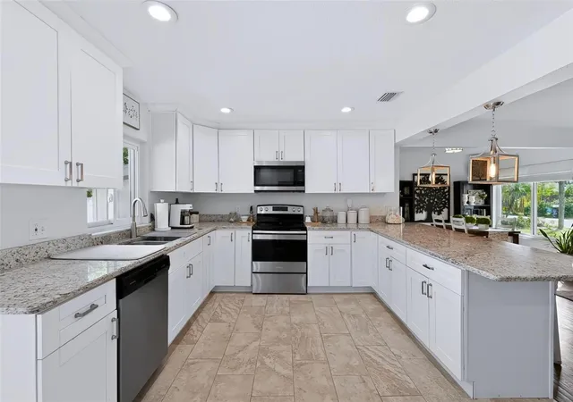 Photo 3 of Single family home for sale at 615 Brookside Dr, Clearwater, FL 33764 | MLS# TB8553672 | Listing updated on 2026-10-22