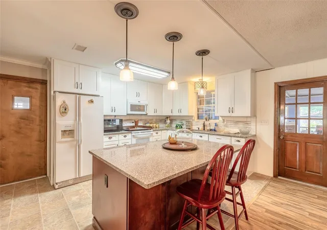 Photo 4 of Single family home for sale at 1225 Vine St, Daytona Beach, FL 32117 | MLS# NS1089397 | Listing updated on 2026-10-01