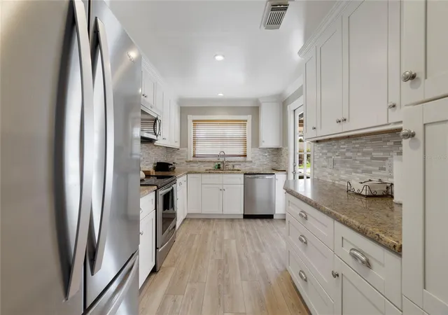 Photo 3 of Single family home for sale at 12631 Indiana Woods Ln, Orlando, FL 32824 | MLS# O6446247 | Listing updated on 2026-10-01