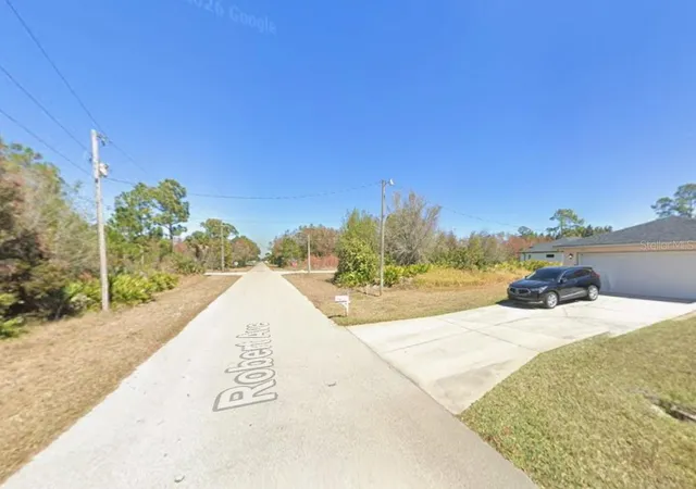 Photo 2 of Land for sale at 921 Robert Ave, Lehigh Acres, FL 33936 | MLS# K4903829 | Listing updated on 2026-10-01