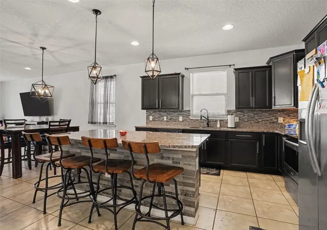 Photo 4 of Single family home for sale at 8706 Hinsdale Hts Dr, Polk City, FL 33868 | MLS# TB8553735 | Listing updated on 2026-10-02