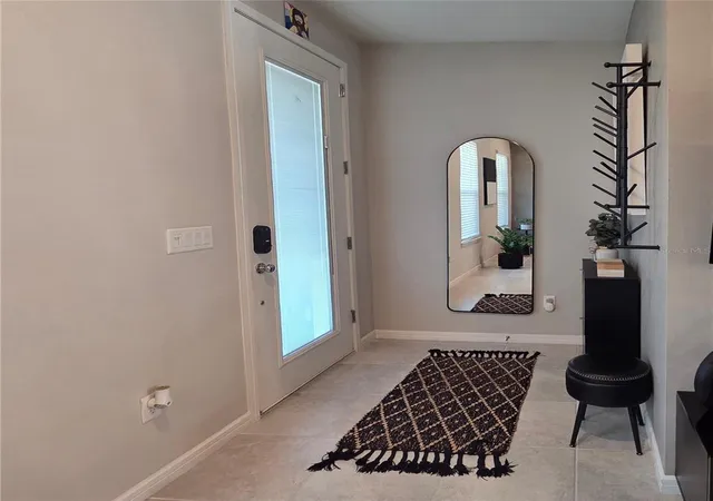 Photo 4 of Townhouse for sale at 10474 Folly Beach Rd, Orlando, FL 32827 | MLS# O6446282 | Listing updated on 2026-10-02