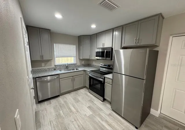 Listing Photo 1 - Condo for sale in building located at 106-108 W Orange Ave, LAKE WALES, FL 33853
