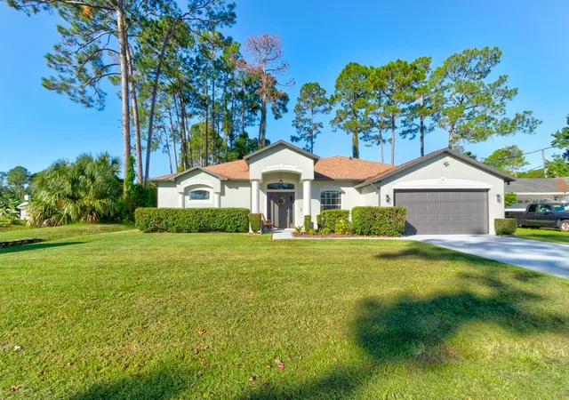 Photo 1 of Single family home for sale at 37 Woodlyn Ln, Palm Coast, FL 32164 | MLS# FC321817 | Listing updated on 2026-10-17
