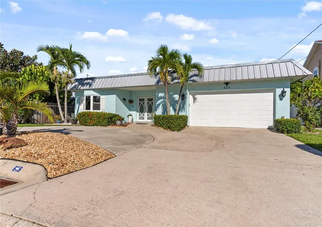 Photo 1 of Single family home for sale at 404 Harbor Dr S, Indian Rocks Beach, FL 33785 | MLS# TB8553795 | Listing updated on 2026-10-17