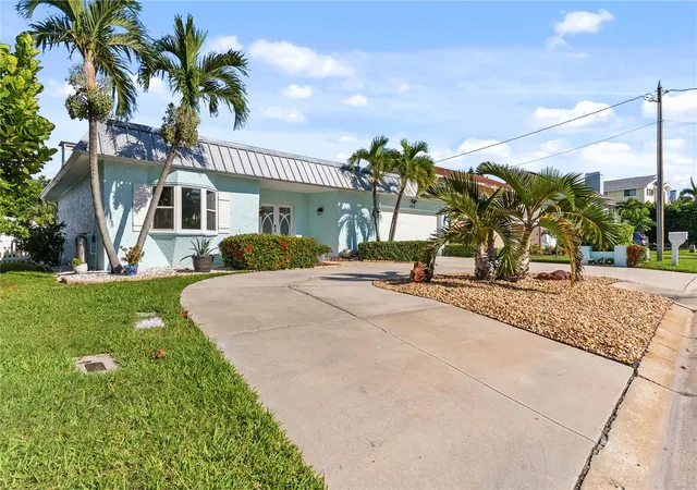 Photo 2 of Single family home for sale at 404 Harbor Dr S, Indian Rocks Beach, FL 33785 | MLS# TB8553795 | Listing updated on 2026-10-17