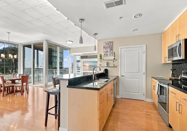 Photo 2 of Condo for sale at 155 S Court Ave #1102, Orlando, FL 32801 | MLS# O6446337 | Listing updated on 2026-10-02