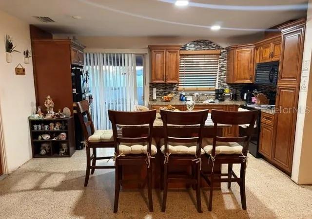 Photo 4 of Single family home for sale at 10357 Kumquat Ln, Seminole, FL 33772 | MLS# TB8553813 | Listing updated on 2026-10-06