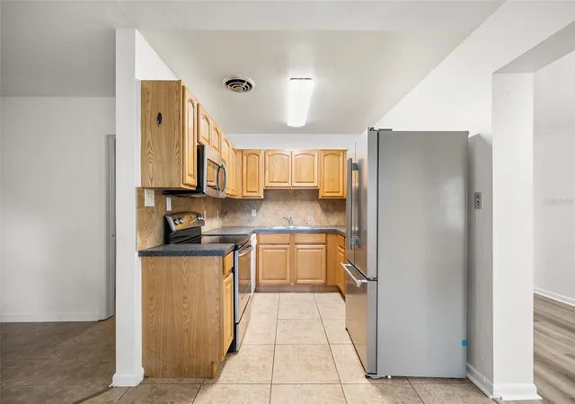 Photo 3 of Single family home for sale at 1321 NE 20th Avenue, Gainesville, FL 32609 | MLS# GC543903 | Listing updated on 2026-10-06