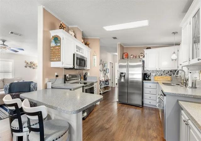 Photo 3 of Manufactured home for sale at 624 Mount Piney Ave NE #703, Saint Petersburg, FL 33702 | MLS# TB8553820 | Listing updated on 2026-10-06