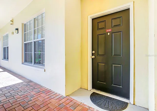 Listing Photo 1 - Condo for sale in building located at 940 Spring Park St, CELEBRATION, FL 34747 - Unit #102